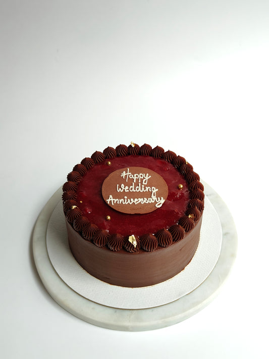 Chocolate Truffle Cake with Strawberry Compote